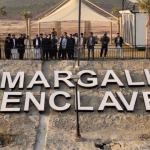 DHA Margalla Enclave site development view February 2026 Islamabad